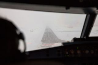 Pilot im Cockpit